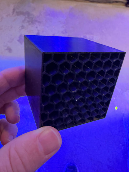 Angled view of the Mysid Shrimp Hotel showing the solid side and the honeycomb face
